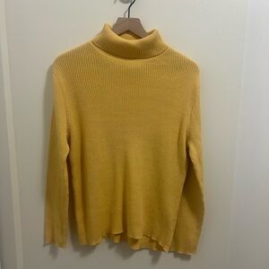 Yellow turtleneck sweater